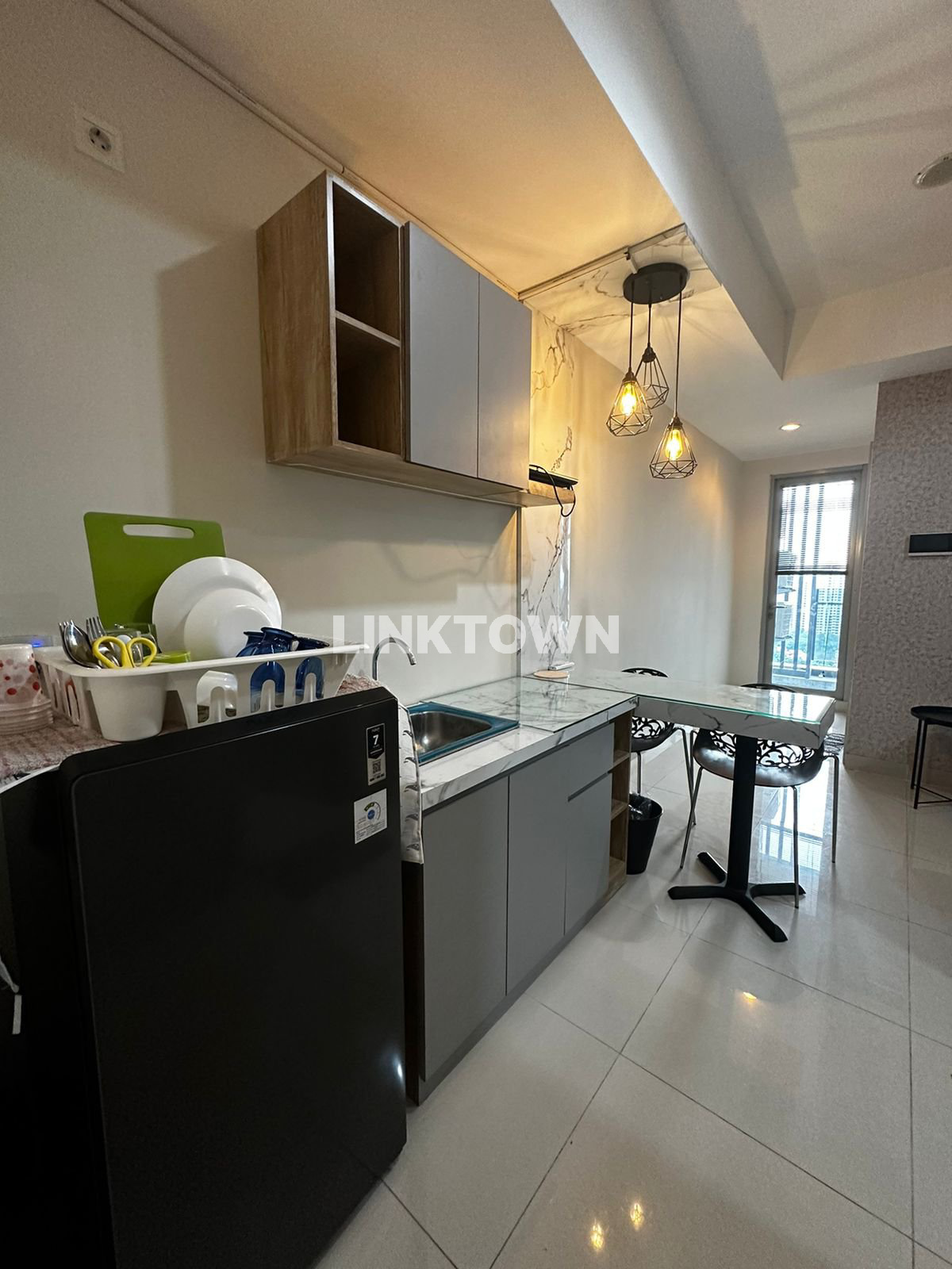 Full Furnish dan Langsung Akses Garden Apartemen 1 Br di Grand Sungkono Lagoon